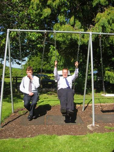 On swings during the wedding.